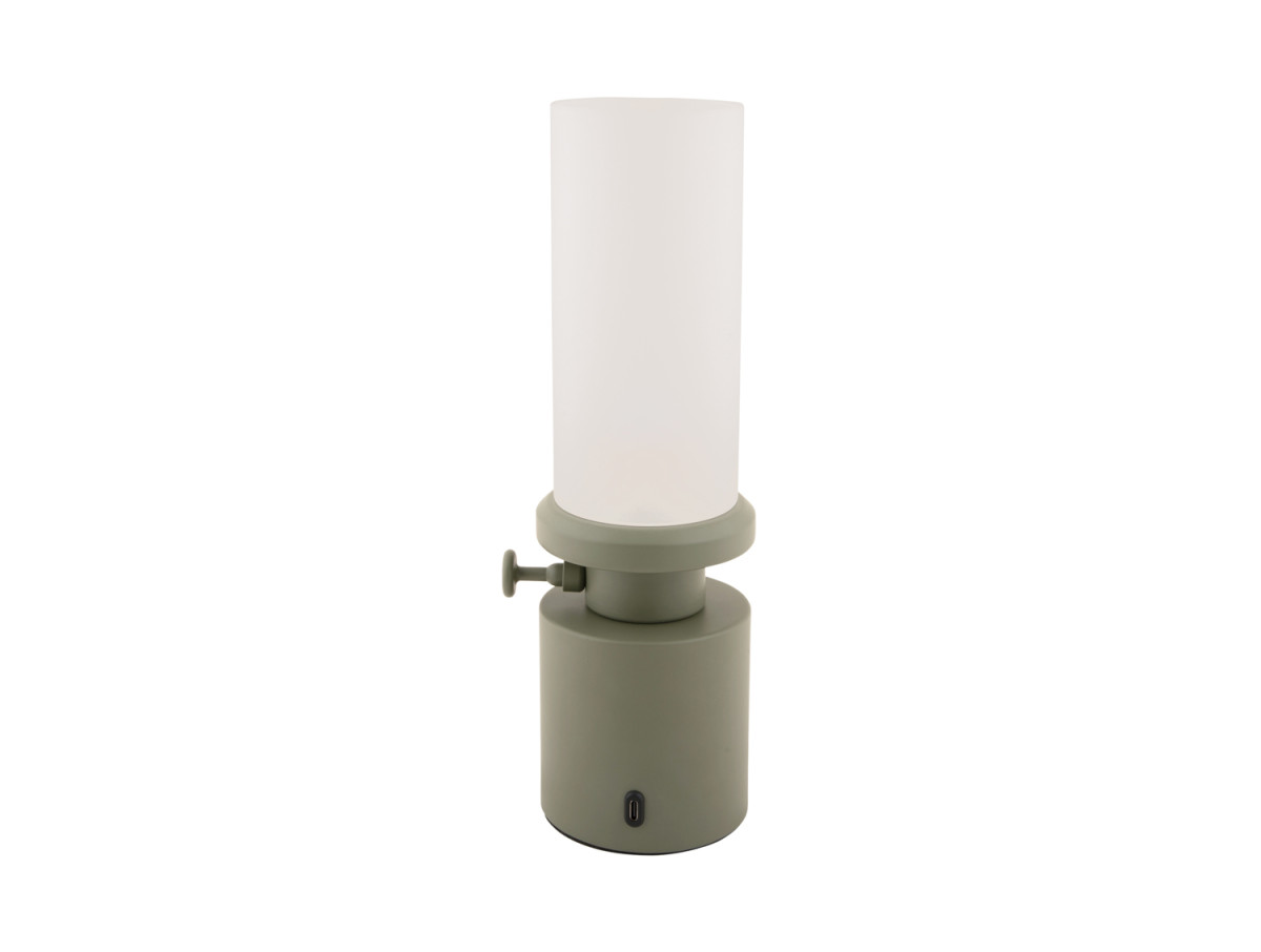 Een draagbare lamp op tafel